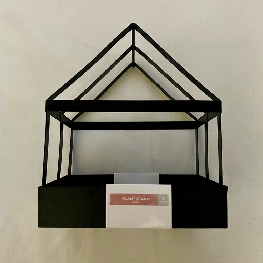 Haunted house plant stand